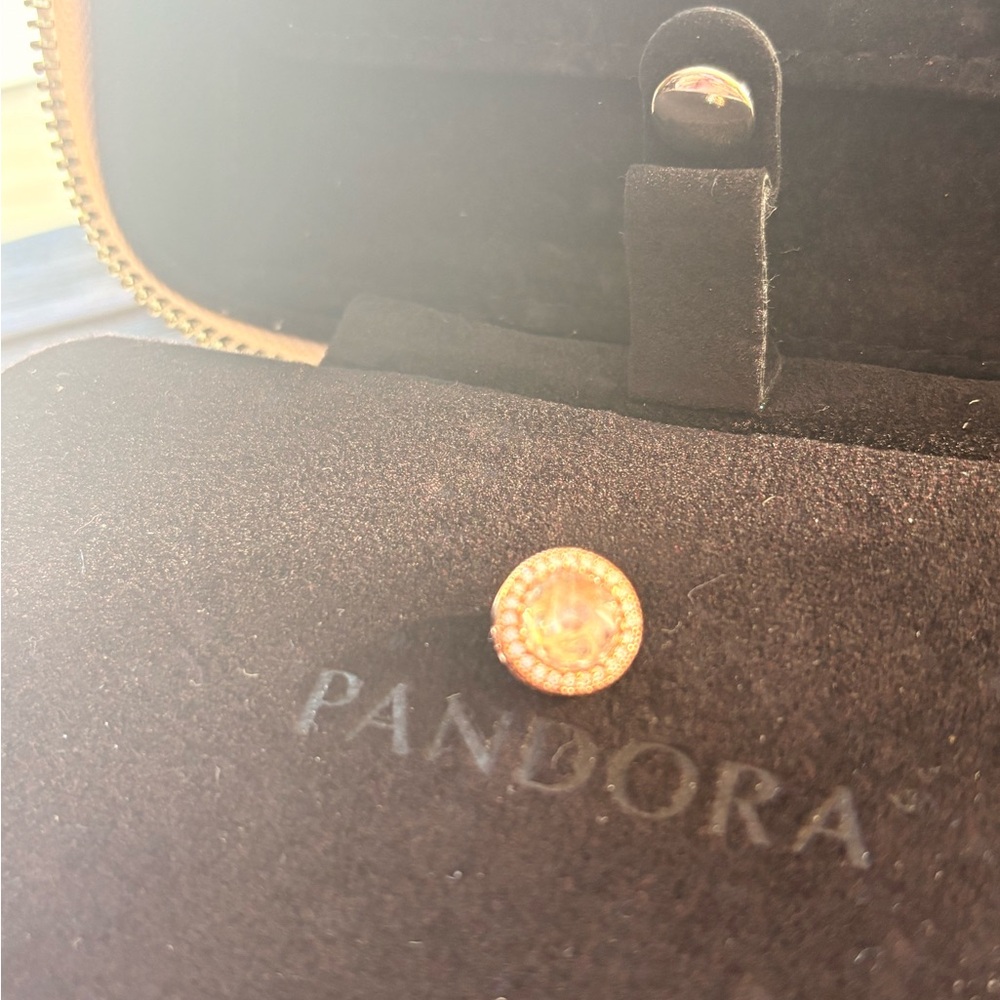 Pandora rose gold charm with pink stone